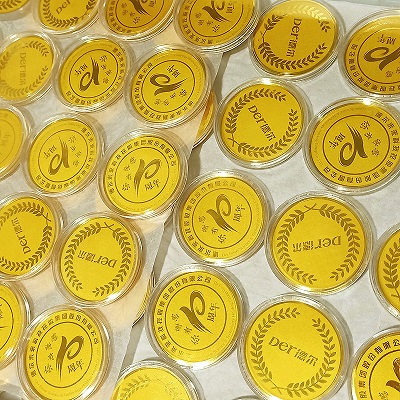 德尔未来科技控股集团足金纪念章批量定制大货照